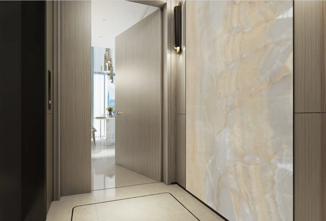 A private lift lobby with marble wall panels and motion sensor LED lighting